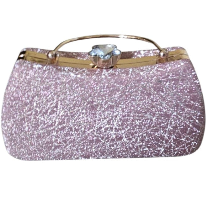 Pink glittery handbag with a gold handle on a white background